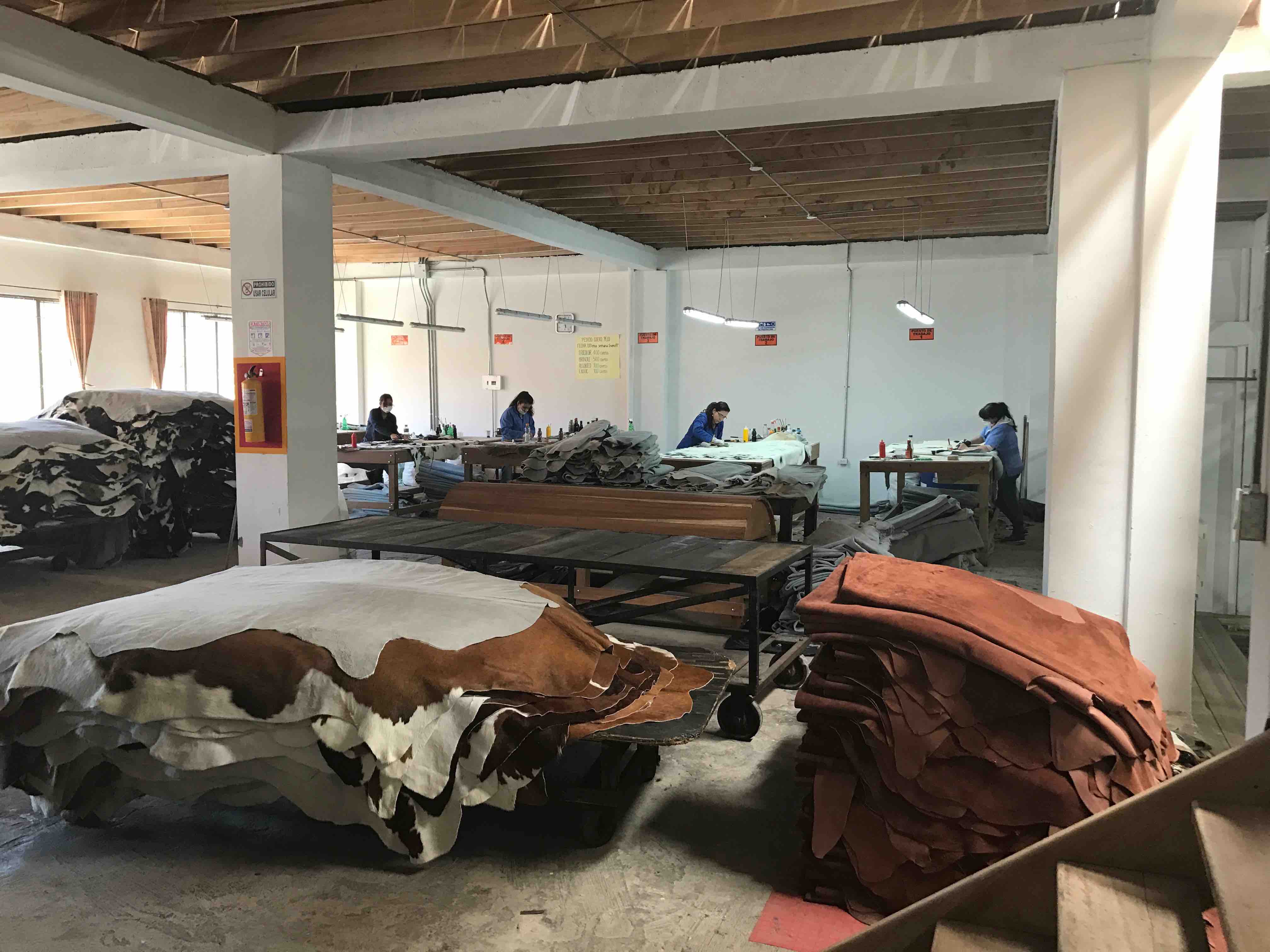 workers tanning cow hides workers tanning cow hides